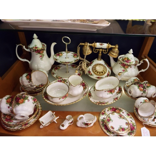 30 - A selection of Royal Albert 'Old Country Rose' tea-ware, sauce boat, telephone and ornaments