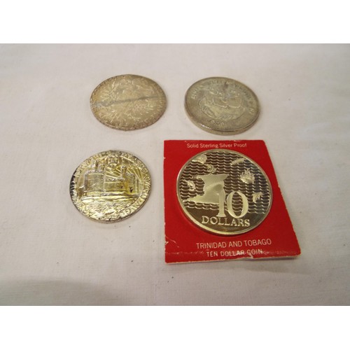 139 - Four silver coins 1979 Costa Rica, 1974 Trinidad and Tobago proof coins, reproduction 1780 Burg-co T... 