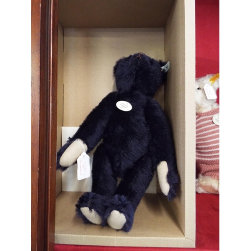 233 - A boxed Limited Edition Steiff '1909 Teddy Bear' 35cm having dark blue mohair and growler hand stitc... 