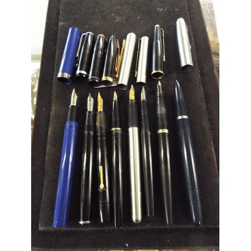 121A - A mixed selection of pens, fountain pens and pencils to include Parker, Waterman and Schaffer