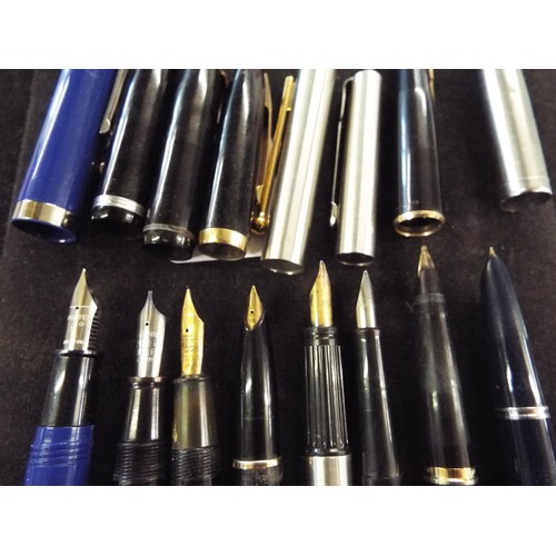 121A - A mixed selection of pens, fountain pens and pencils to include Parker, Waterman and Schaffer