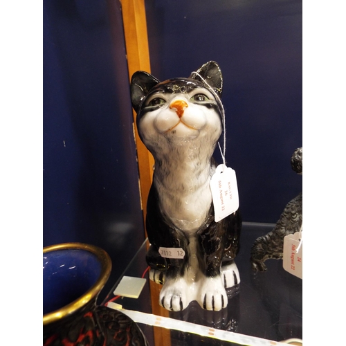 26 - A Winstanley style seated cat