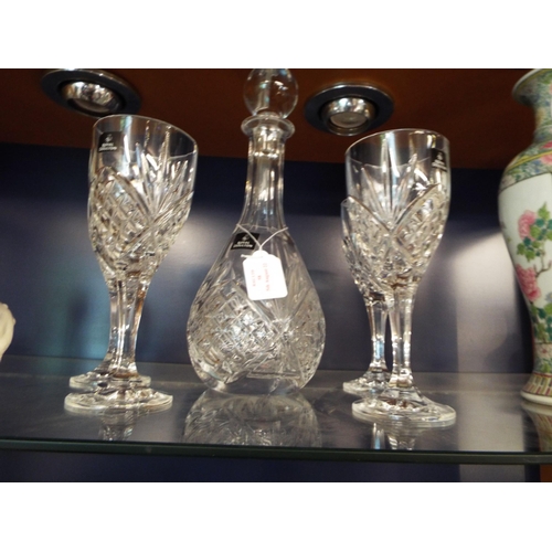 58 - A Royal Doulton crystal glass decanter and four glasses