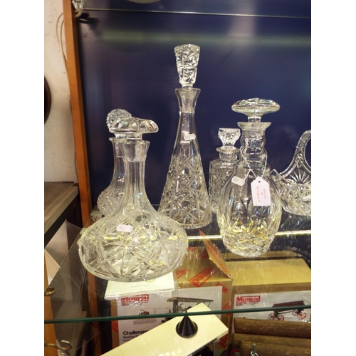 92 - Five assorted crystal glass decanters