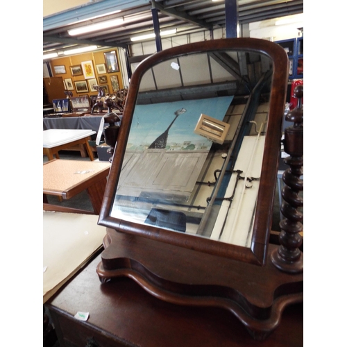 462 - A Victorian mahogany swing dressing mirror with barley twist supports