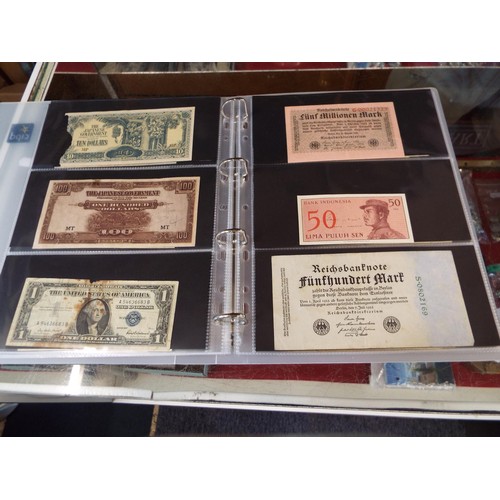 101 - An album housing approx seventy one foreign bank notes to include 'Republica Argentina', 'Banque Du ... 