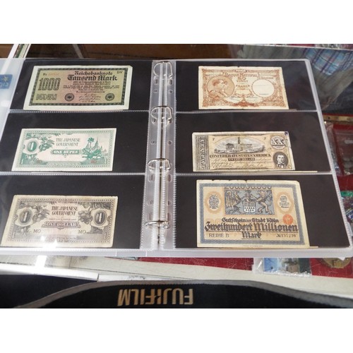 101 - An album housing approx seventy one foreign bank notes to include 'Republica Argentina', 'Banque Du ... 