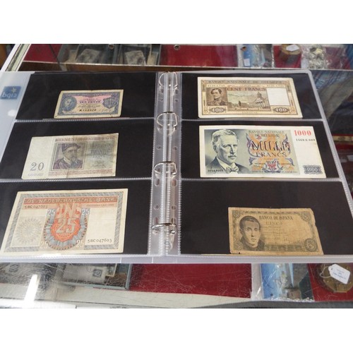 101 - An album housing approx seventy one foreign bank notes to include 'Republica Argentina', 'Banque Du ... 