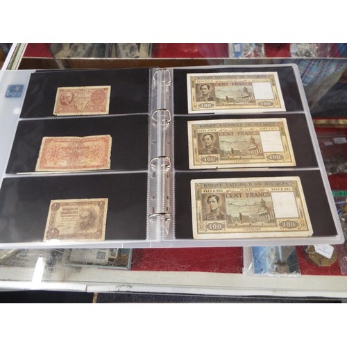 101 - An album housing approx seventy one foreign bank notes to include 'Republica Argentina', 'Banque Du ... 