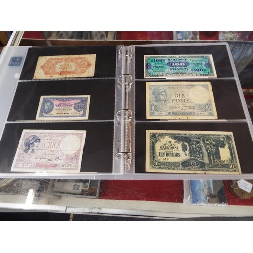 101 - An album housing approx seventy one foreign bank notes to include 'Republica Argentina', 'Banque Du ... 