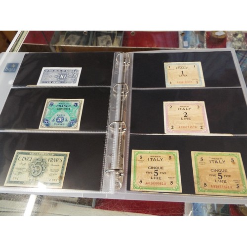 101 - An album housing approx seventy one foreign bank notes to include 'Republica Argentina', 'Banque Du ... 