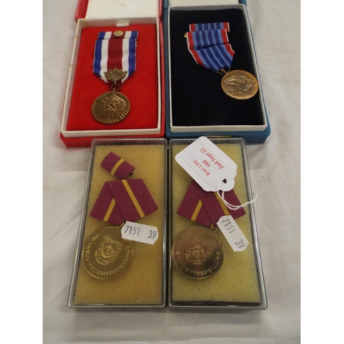 100 - A selection of boxed medals (4)
