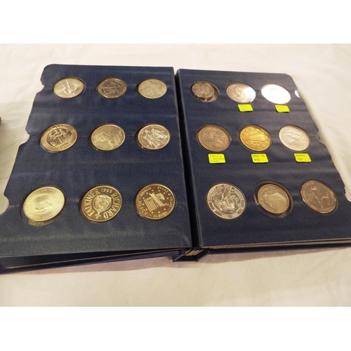 108 - A coin library album containing forty four British and other crowns and coins to include Preserve th... 