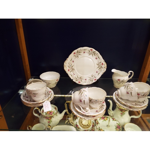 16 - A Royal Standard Fancy Free tea set having floral and fern decoration to include cups, saucers,  sid... 