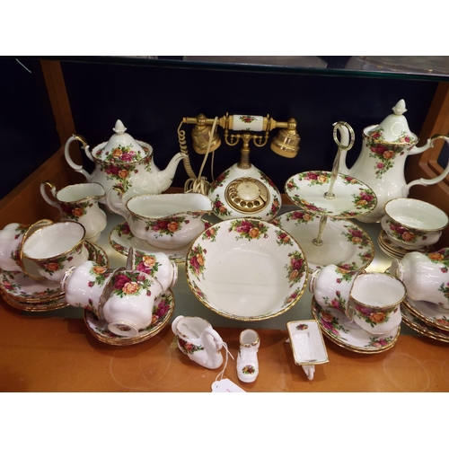 17 - A selection of Royal Albert 'Old Country Rose' tea-ware, sauce boat, telephone and ornaments