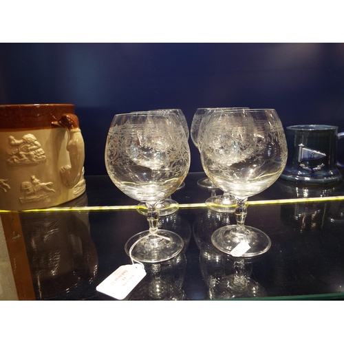 44 - A set of six etched glass goblets