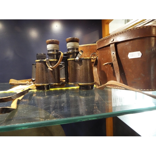 60 - A pair of Ross vintage binoculars in the original leather case together with another pair