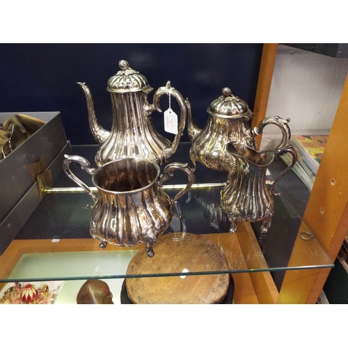 63 - An ornate silver-plated tea-set