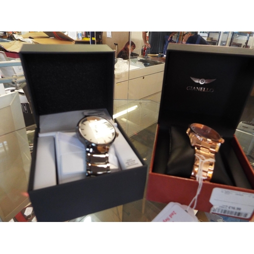 187 - A boxed Geoffrey Beene black diamond gents wristwatch and a boxed Gianello gents wristwatch