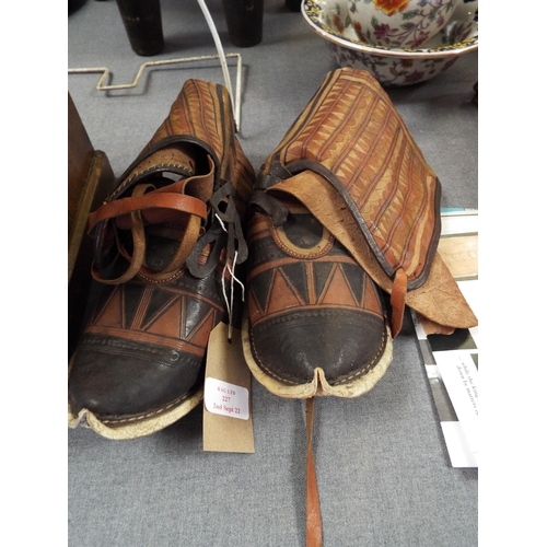 227 - A pair of West African shoes