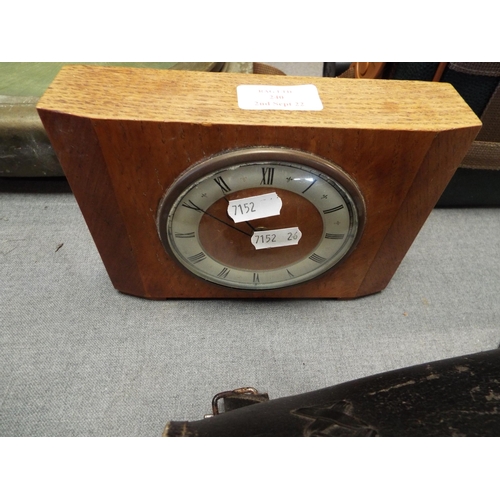 240 - An art deco style oak mantel clock