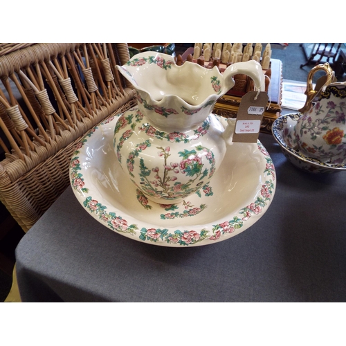 252 - An Ironstone washbowl and jug with Indian tree decoration