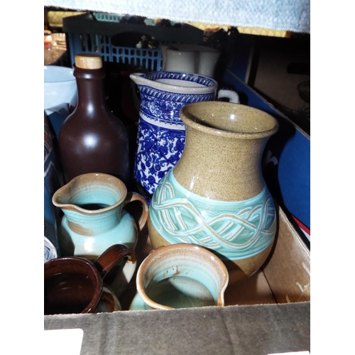 264 - A selection of assorted stoneware vases and jugs and four hand prints