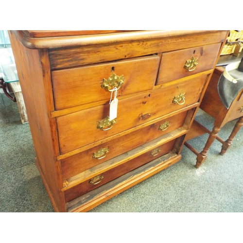 486 - A stained pine chest of two short over three long drawers