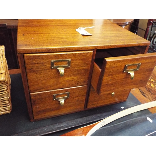 489 - A vintage oak four drawer file unit