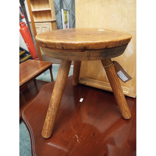 512 - A vintage Welsh milking stool with leather engraved decoration