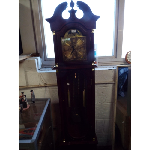 587 - A battery operated longcase clock