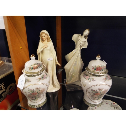 18 - Two porcelain figures and a pair of ginger jars