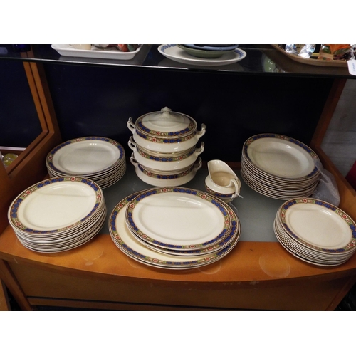 30 - A Burslem Midwinter part dinner service to include tureens, plates, bowls etc