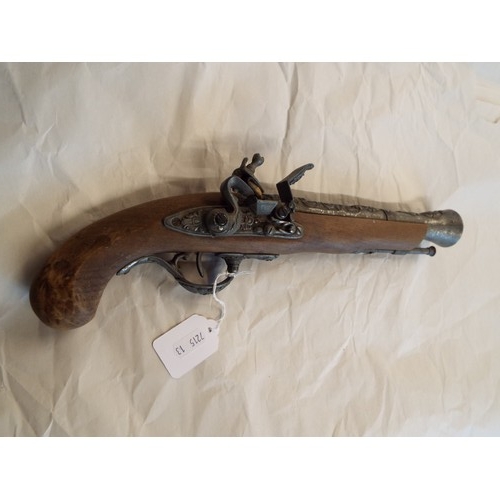 101 - A replica flintlock pistol