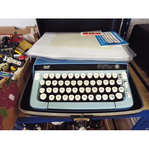 338 - A cased vintage Smith-Corona 'Sterling' typewriter