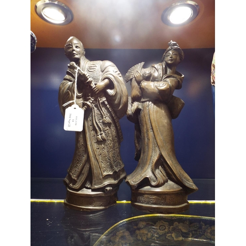 14 - A pair of loaded resin Oriental figures