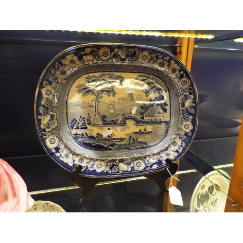 16 - An early blue and white meat platter with river scene, boats, figure decoration