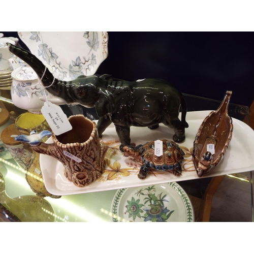 25 - A Bavarian porcelain elephant together with three Wade items