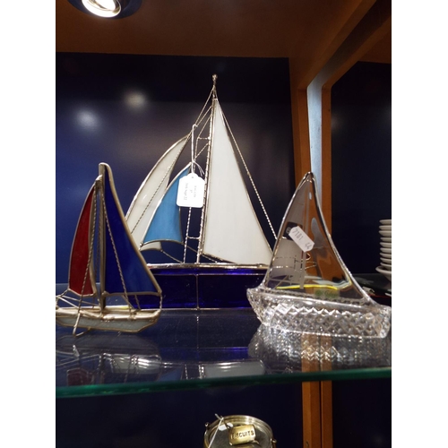 37 - A Galway Irish crystal sailing yacht and two metal and glass yachts