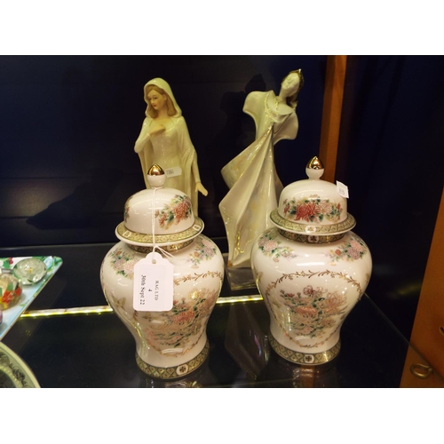 4 - Two porcelain figures and a pair of ginger jars