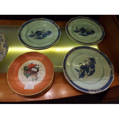 47 - A set of six Adams of Tunstall blue plates 'Old Free Hand', and a set of six Ridgway fruit decorated... 