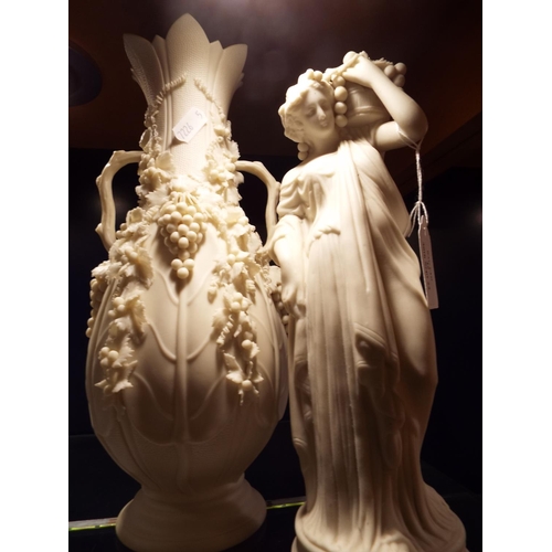 49 - A Parian-ware vase with applied grape and vine and a figurine