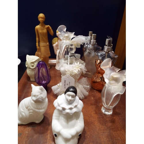 52 - A mixed selection of assorted perfume bottle to include Avon, Ninna Ricci, Jean Paul Gaultier etc