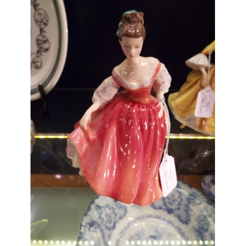 9 - A Royal Doulton figurine 'Fair Lady', (coral pink) HN 2835