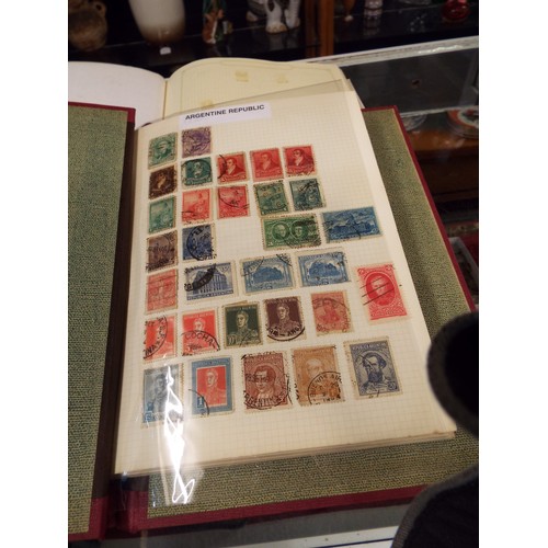 63 - A album of stamps of the World and an empty SG Simplex medium album