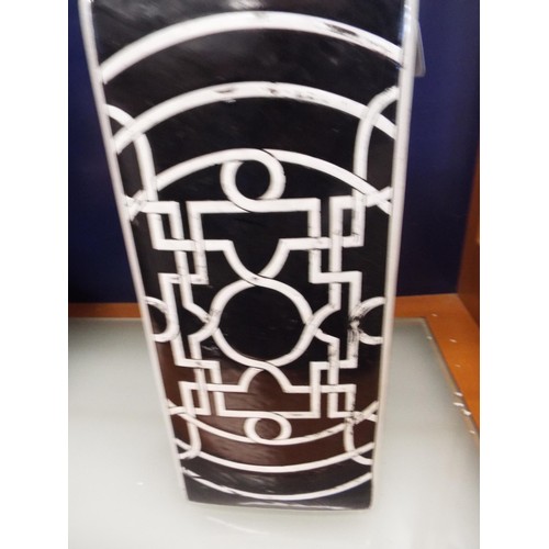 35 - A large ceramic black and white vase with stylised decoration