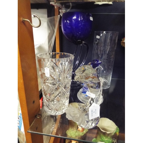 92 - A selection of glass ware to include two leaping dolphins, vases (5)