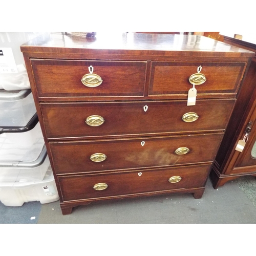 641 - A Georgian mahogany chest of two short over three long graduating drawers