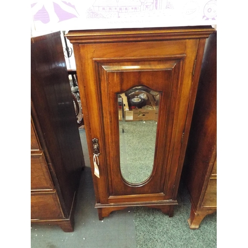 642 - A Victorian mahogany bevel mirror door music cabinet with two internal shelves