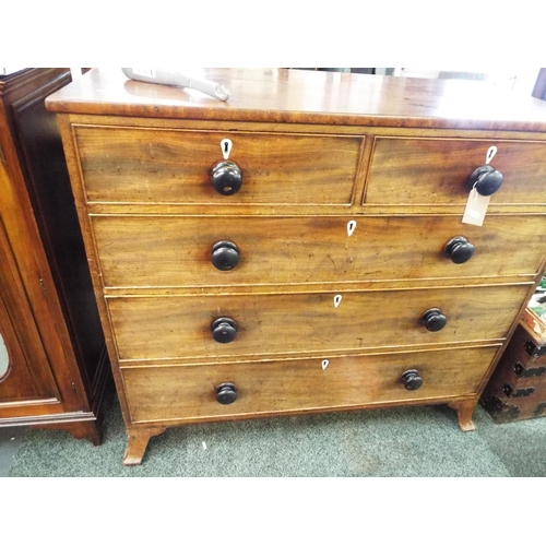 643 - A Georgian mahogany chest of two short over three long graduating drawers